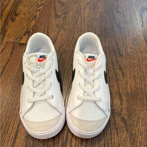 Nike White Sneakers with Black Swoosh